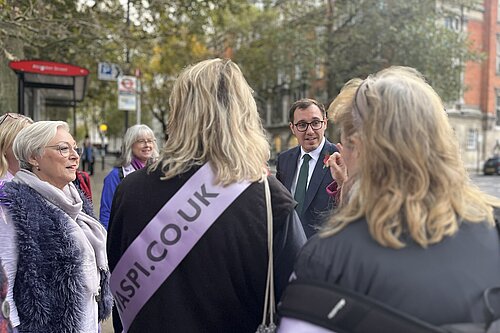 Tom Gordon with WASPI women on a street in London