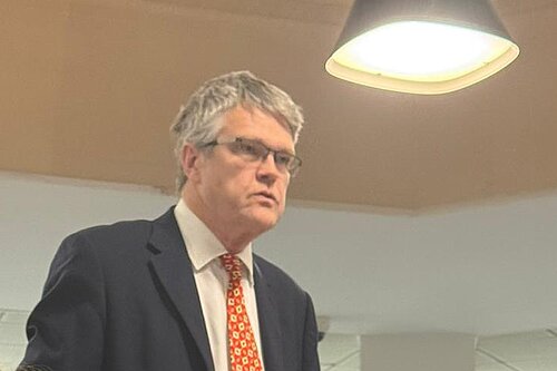 Cllr Jon Ball speaking at a council meeting