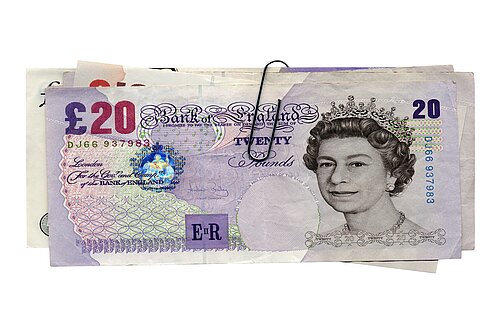 Multiple fifty pound notes.