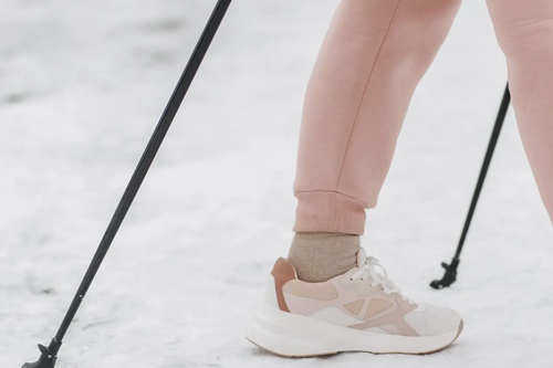 legs walking in the snow