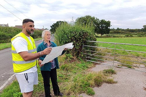 Ajit Atwal and Lucy Care looking at plans to build on the land off Moorway Lane