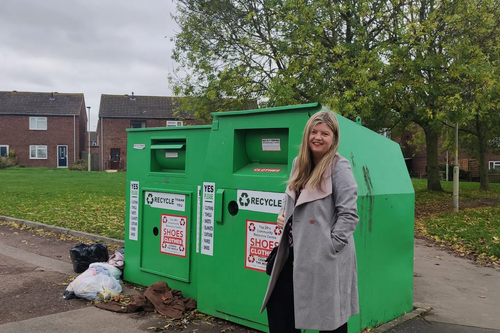 Caroline Courtney at the Seventh Avenue clothes banks