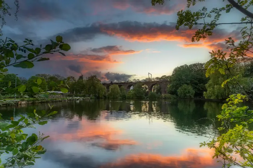 Viaduct over Central Park at sunset in Chelmsford