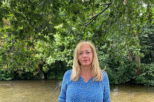 Liz Jarvis stood in-front of the River Itchen