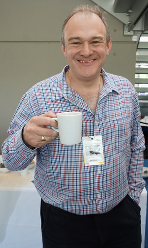Image courtesy of KNDaws GLD Conference 2018 - Ed Davey enjoying a well earned cuppa