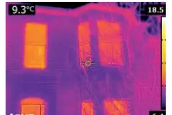 Heat images showing losses through a building's envelope