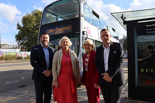 Photo of WECA Lib Dem Leaders in front of a bus