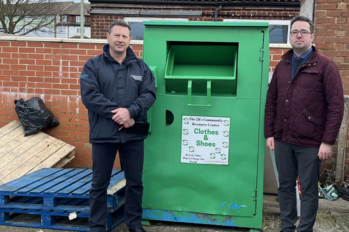 Kevin Lee, environmental crime officer at Gloucester City Council, and Councillor Sebastian Field with the clothes bank at Burns Avenue.