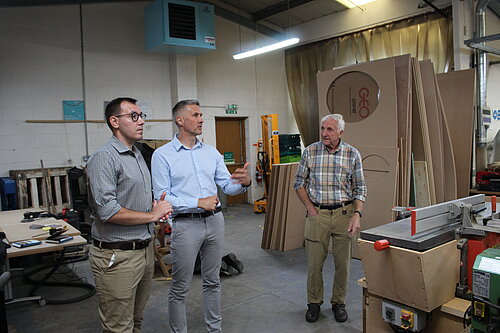 Tom Gordon stood being shown around Claro Enterprises