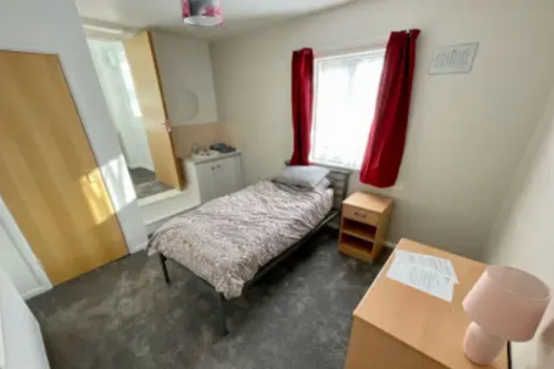 bedroom in a hostel for people who are homeless