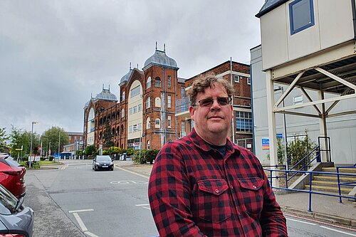 Arran Angus outside Whipps Cross Hospital