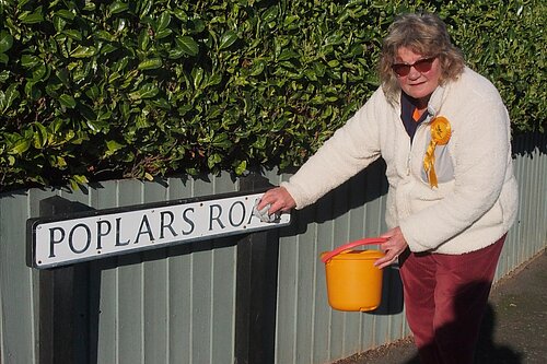 Cleaning street sign
